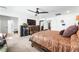 Comfortable main bedroom with cozy carpets, large windows and private bathroom entrance at 8415 Iron Heart Ln, Las Vegas, NV 89113