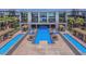 Beautiful resort-style pool area with cabanas and lounge chairs for relaxing and enjoying the sun at 8925 W Flamingo Rd # 310, Las Vegas, NV 89147