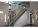 Bright entryway with hardwood floors, staircase, and soaring ceilings, creating a welcoming atmosphere at 8982 Emerald Waters Ct, Las Vegas, NV 89147