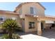 Home featuring a covered patio that offers access to an outdoor kitchen, perfect for outdoor entertaining at 8982 Emerald Waters Ct, Las Vegas, NV 89147
