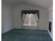 Bright and spacious living room with fireplace and vaulted ceiling, bathed in natural light at 8982 Emerald Waters Ct, Las Vegas, NV 89147