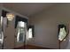 Open living room with soaring ceilings, large windows, and elegant drapery at 8982 Emerald Waters Ct, Las Vegas, NV 89147