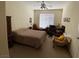 Bedroom with ceiling fan, plush carpets and a comfortable bed at 9000 Las Vegas Blvd # 1271, Las Vegas, NV 89123