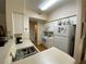 Functional kitchen with white cabinetry, modern appliances, and laminate countertops at 9000 Las Vegas Blvd # 1271, Las Vegas, NV 89123