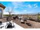 Backyard featuring desert landscaping with a seating area and open views of the desert landscape at 9165 Tudor Park Pl, Las Vegas, NV 89145
