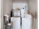 Efficient laundry room with washer, dryer, and ample storage space at 9165 Tudor Park Pl, Las Vegas, NV 89145