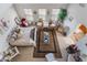 Bright living room featuring plush sofas, a glass coffee table, and many chairs at 9165 Tudor Park Pl, Las Vegas, NV 89145