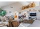 Bright and airy main bedroom with vaulted ceiling, decorative loft space, and a TV at 9165 Tudor Park Pl, Las Vegas, NV 89145