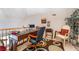Lofted office space features a desk, office chair, and a large window at 9165 Tudor Park Pl, Las Vegas, NV 89145