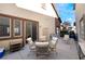 Cozy patio area with table and chairs, perfect for outdoor dining and relaxation at 9165 Tudor Park Pl, Las Vegas, NV 89145