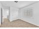 Neutral bedroom with carpeted flooring, closet, and shuttered windows at 9788 Altadena St, Las Vegas, NV 89183