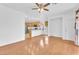 Unfurnished dining area with hardwood floors and an open view of the kitchen at 9788 Altadena St, Las Vegas, NV 89183