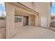 Covered back patio with a sliding glass door offers seamless indoor-outdoor living and entertaining at 9788 Altadena St, Las Vegas, NV 89183