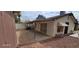 Backyard features a shed, covered patio and desert landscaping at , Las Vegas, NV 89103