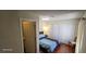 Cozy bedroom features wood floors, and closet with sliding doors at , Las Vegas, NV 89103
