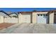 This home features multiple garage doors with driveway for easy parking and access to the house at , Las Vegas, NV 89103