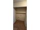 Simple laundry room with tile flooring, shelf, and hookups at , Las Vegas, NV 89103