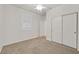 Bedroom with a ceiling fan and double closet at 1026 Via Saint Andrea Pl, Henderson, NV 89011