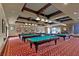 A billiard room featuring multiple pool tables, overhead lighting, and tasteful decor at 1026 Via Saint Andrea Pl, Henderson, NV 89011