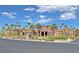 Elegant community clubhouse featuring beautiful architecture, landscaping and palm trees at 1026 Via Saint Andrea Pl, Henderson, NV 89011