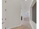 Bright hallway featuring wood-look floors, and light-colored walls at 1026 Via Saint Andrea Pl, Henderson, NV 89011