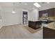 Bright kitchen with stainless steel appliances, a center island, and ample cabinet space for storage at 1026 Via Saint Andrea Pl, Henderson, NV 89011