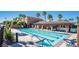 Community pool with lap lanes, pergola, and surrounding palm trees at 1026 Via Saint Andrea Pl, Henderson, NV 89011