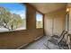 Relax on the balcony with scenic views and comfortable seating at 10270 Gilmore Canyon Ct # 202, Las Vegas, NV 89129