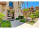 Inviting building entrance with a well-kept walkway, desert landscaping, and convenient access at 10270 Gilmore Canyon Ct # 202, Las Vegas, NV 89129