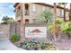 Attractive Legends community sign with colorful landscaping and desert-inspired design at 10270 Gilmore Canyon Ct # 202, Las Vegas, NV 89129