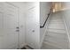Home entryway with stairs leading up, with two doors at 10270 Gilmore Canyon Ct # 202, Las Vegas, NV 89129