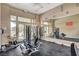 Bright exercise room featuring various machines, mirrors, and ample space for a complete workout at 10270 Gilmore Canyon Ct # 202, Las Vegas, NV 89129