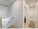 Upstairs hallway featuring wood-look flooring and neutral wall paint at 10270 Gilmore Canyon Ct # 202, Las Vegas, NV 89129