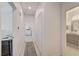 Hallway that features a carpet, closet, and doors that lead to other areas of the home at 10270 Gilmore Canyon Ct # 202, Las Vegas, NV 89129