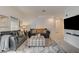 Spacious living room with contemporary furnishings and a large entertainment center at 10270 Gilmore Canyon Ct # 202, Las Vegas, NV 89129