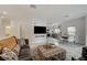 Open-concept living space with seamless transition to the modern kitchen and dining area at 10270 Gilmore Canyon Ct # 202, Las Vegas, NV 89129