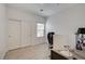 Office space with laminate wood flooring and large closet with mirrored doors, and a modern desk at 10270 Gilmore Canyon Ct # 202, Las Vegas, NV 89129