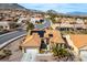 This beautiful property features a terracotta roof with solar panels and desert landscaping at 10640 Mission Lakes Ave, Las Vegas, NV 89134
