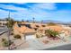 This attractive home has solar panels and a terracotta roof. The mountains provide a beautiful backdrop at 10640 Mission Lakes Ave, Las Vegas, NV 89134