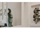 Asian inspired statue and artwork add character to this neutral toned room at 10640 Mission Lakes Ave, Las Vegas, NV 89134