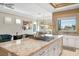 Spacious kitchen island with gas cooktop and room for seating at 10640 Mission Lakes Ave, Las Vegas, NV 89134