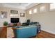 Comfortable living room with hardwood floors, natural light and stylish decor at 10640 Mission Lakes Ave, Las Vegas, NV 89134