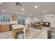 Open living area with kitchen, dining space, and living room; great natural light and modern finishes at 10729 Red Badge Ave, Las Vegas, NV 89166