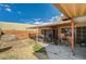 Backyard featuring a covered patio and fencing at 111 Narcissus Ln, Las Vegas, NV 89107