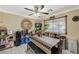 Cozy dining room with a ceiling fan, bench seating and an abundance of shelving at 111 Narcissus Ln, Las Vegas, NV 89107