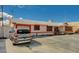 Charming single-story home featuring a spacious driveway with a garage and desert landscaping at 111 Narcissus Ln, Las Vegas, NV 89107