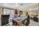 Open floor plan in the living room with sliding glass doors to the back patio at 111 Narcissus Ln, Las Vegas, NV 89107