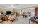 Inviting living room with tiled floors, neutral walls, and a ceiling fan at 111 Narcissus Ln, Las Vegas, NV 89107