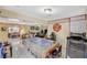 Spacious living room featuring a pool table, tile floors, and plenty of room to entertain at 111 Narcissus Ln, Las Vegas, NV 89107
