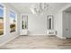 Modern bedroom with wood floors, sleek mirrors, and stylish side tables, offering a sophisticated space at 11280 Granite Ridge Dr # 1101, Las Vegas, NV 89135